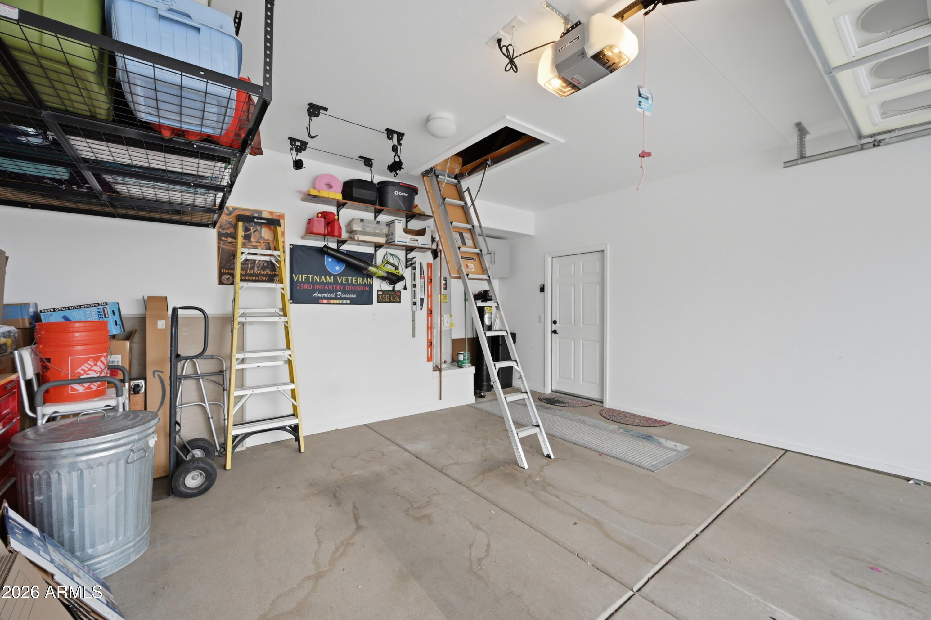 3117 South Signal Butte Road, Unit 476 Mesa, AZ 85212 - Photo 25 of 31 Blanks SC476 Garage Attic Stairs Hangin