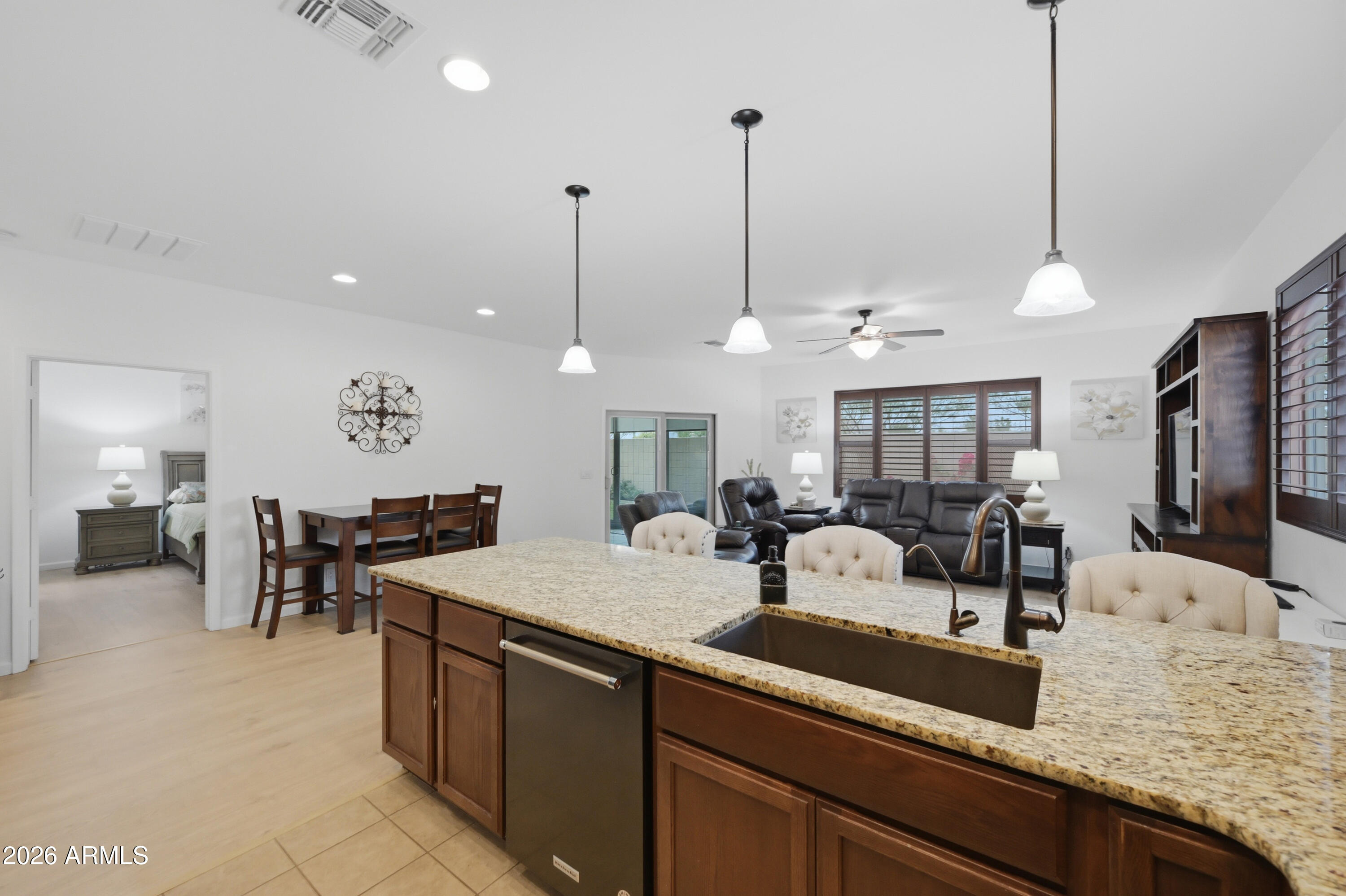 3117 South Signal Butte Road, Unit 476 Mesa, AZ 85212 - Photo 6 of 31 SC476 Kitchen to Great Room and Dining