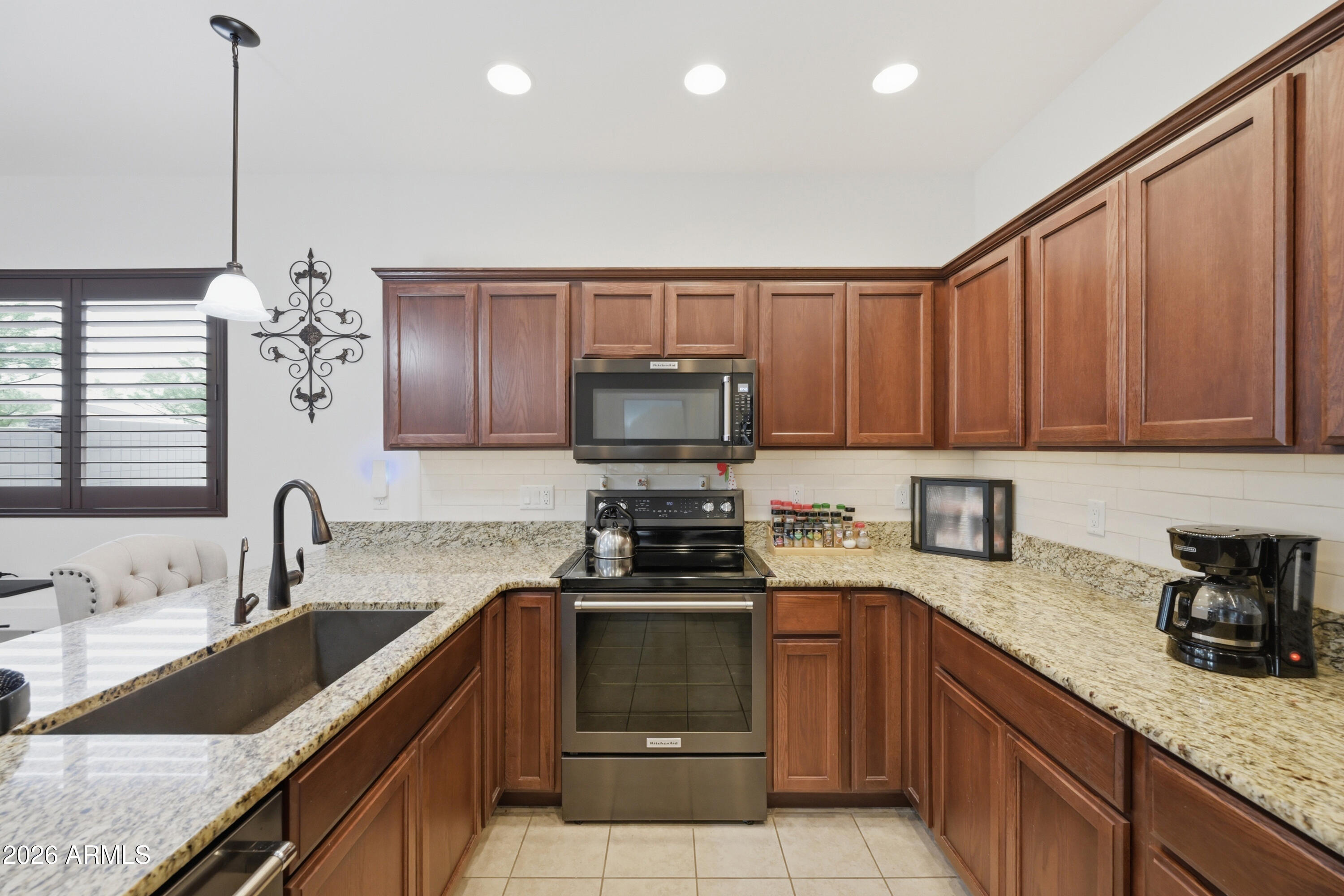 3117 South Signal Butte Road, Unit 476 Mesa, AZ 85212 - Photo 7 of 31 SC476 Kitchen Long View
