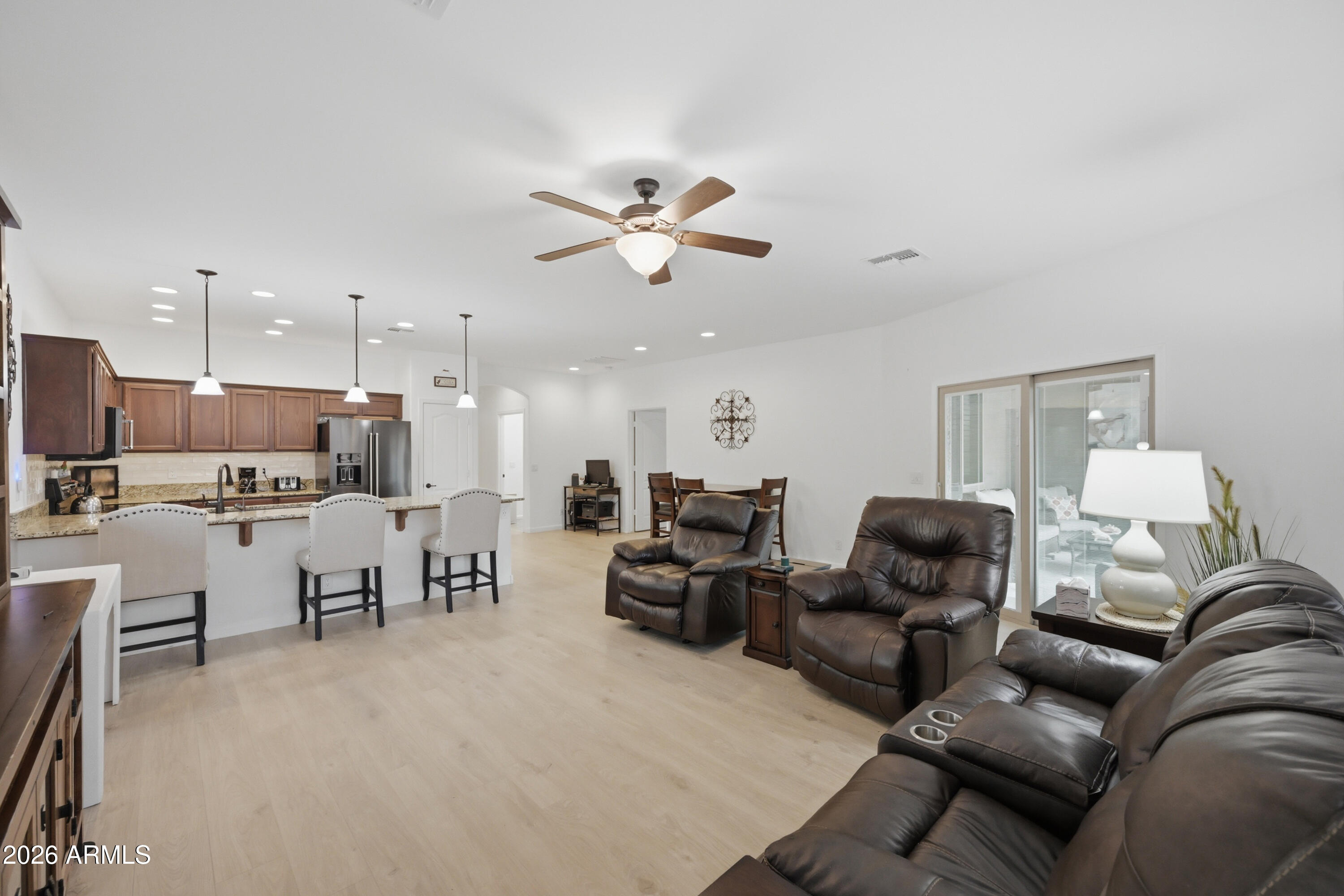 3117 South Signal Butte Road, Unit 476 Mesa, AZ 85212 - Photo 8 of 31 SC476 Great Room to Kitchen
