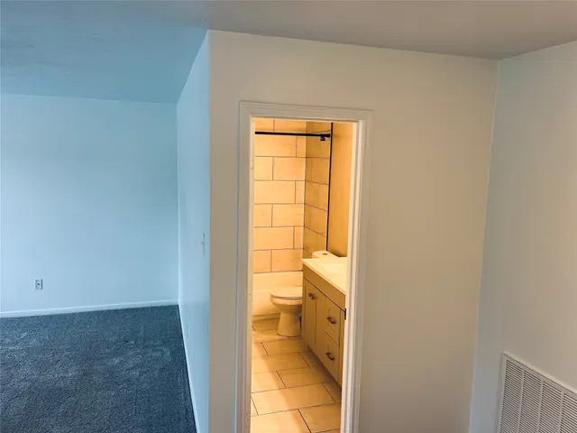 a bathroom with a toilet