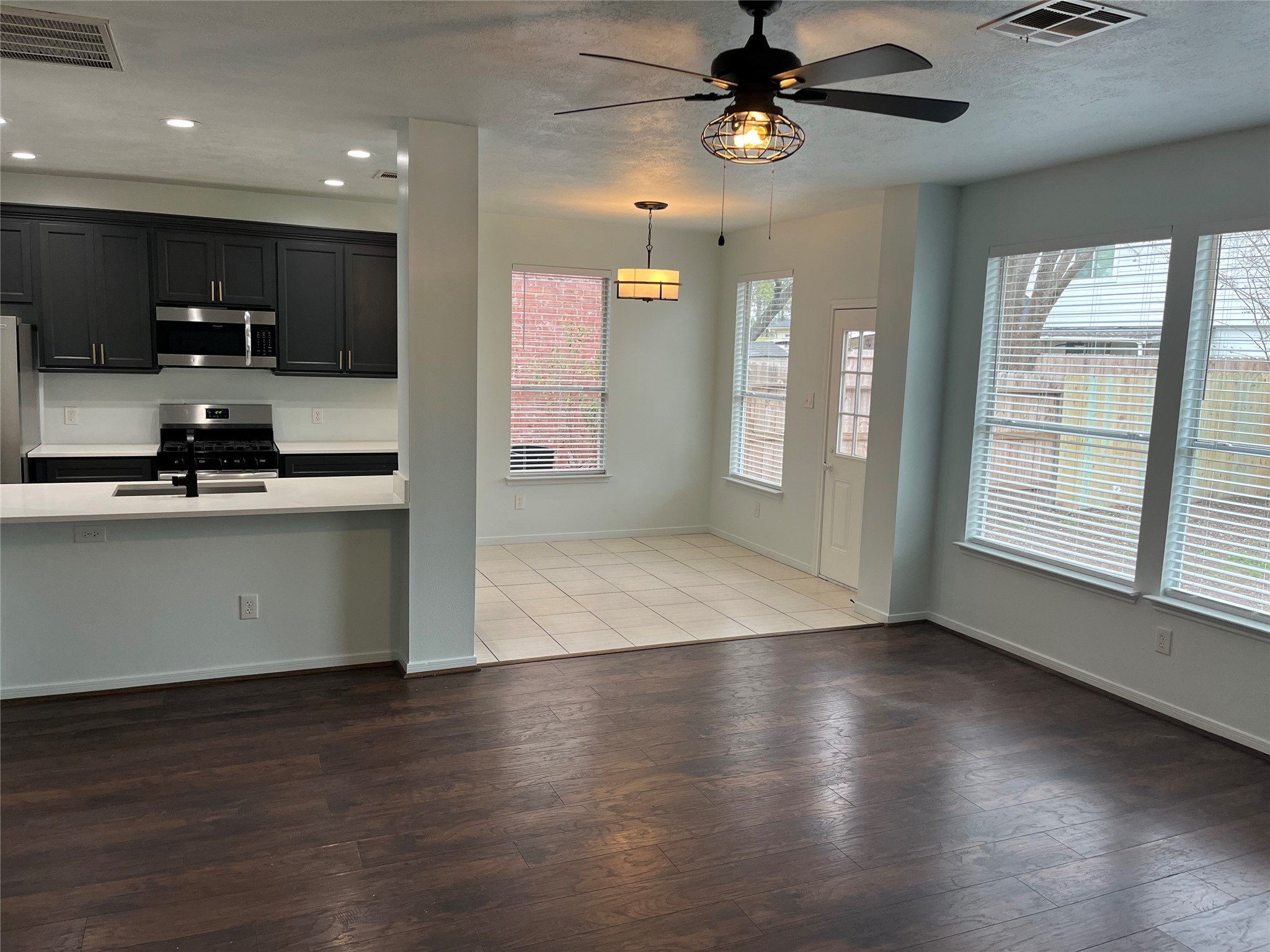 911 Chapwood Court Spring, TX 77373 - Photo 5 of 22 a view of a kitchen with a sink and a window
