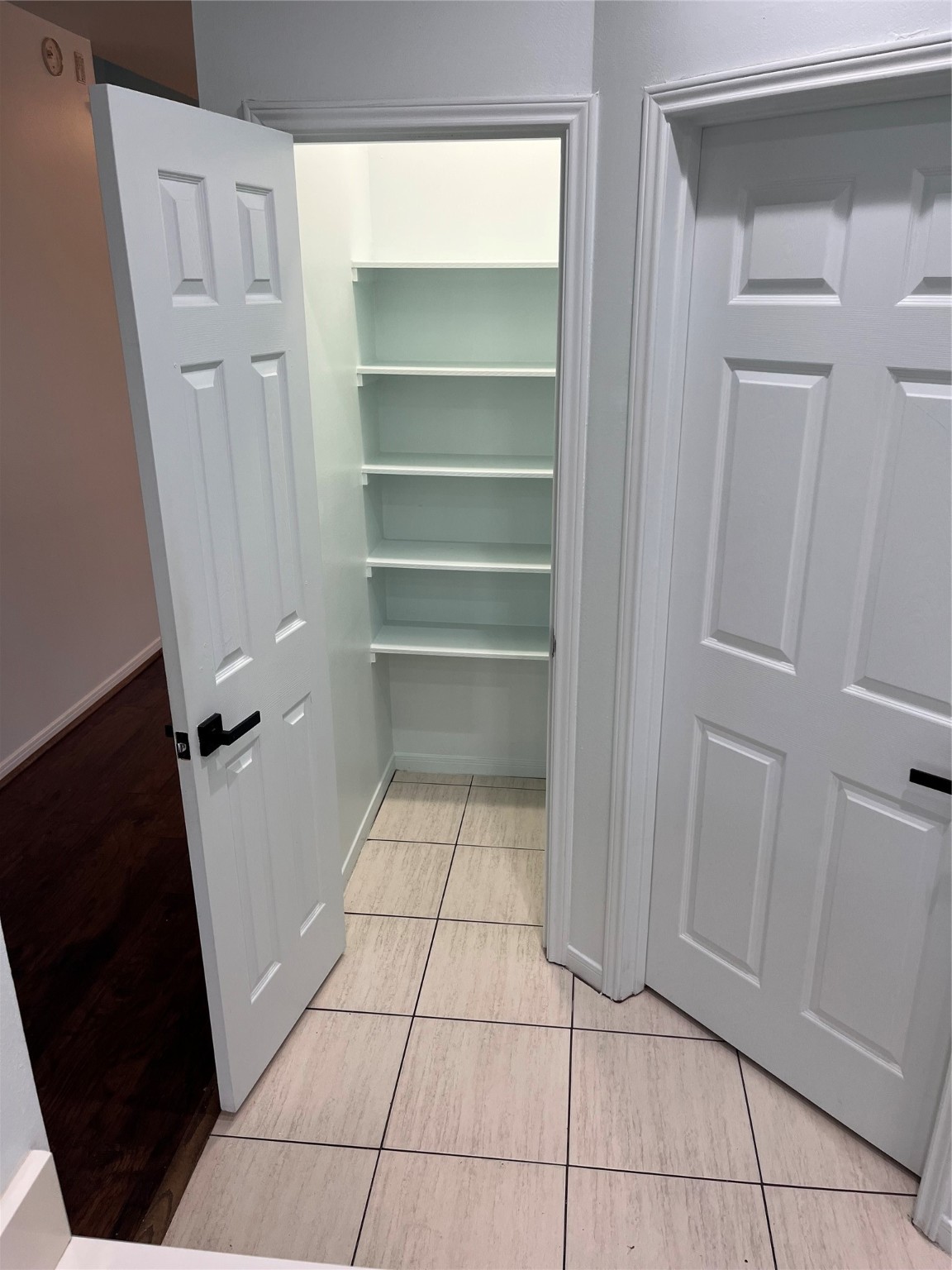 911 Chapwood Court Spring, TX 77373 - Photo 10 of 22 a view of walk in closet with empty racks