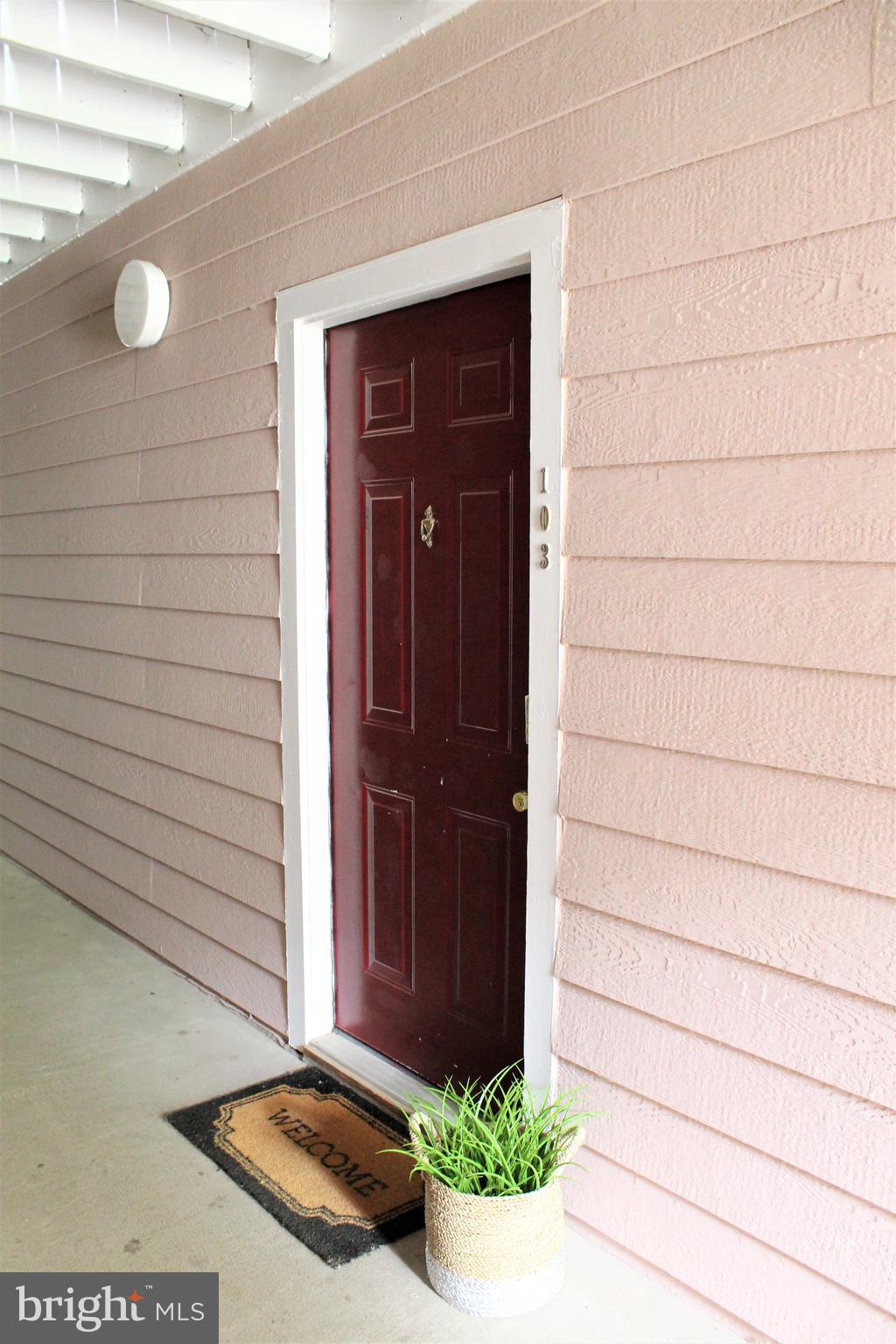 21023 Timber Ridge Terrace, Unit 103 Ashburn, VA 20147 - Photo 3 of 8 Front Door Unit # 103