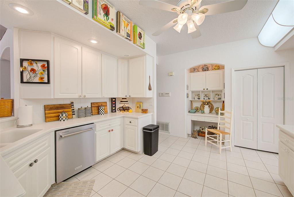 4 Poppy Court Homosassa, FL 34446 - Photo 14 of 55 a kitchen with cabinets and window