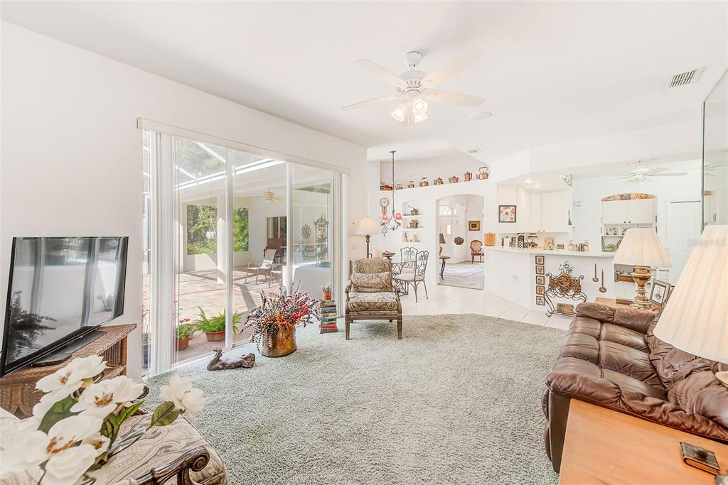 4 Poppy Court Homosassa, FL 34446 - Photo 22 of 55 a living room with furniture and a flat screen tv