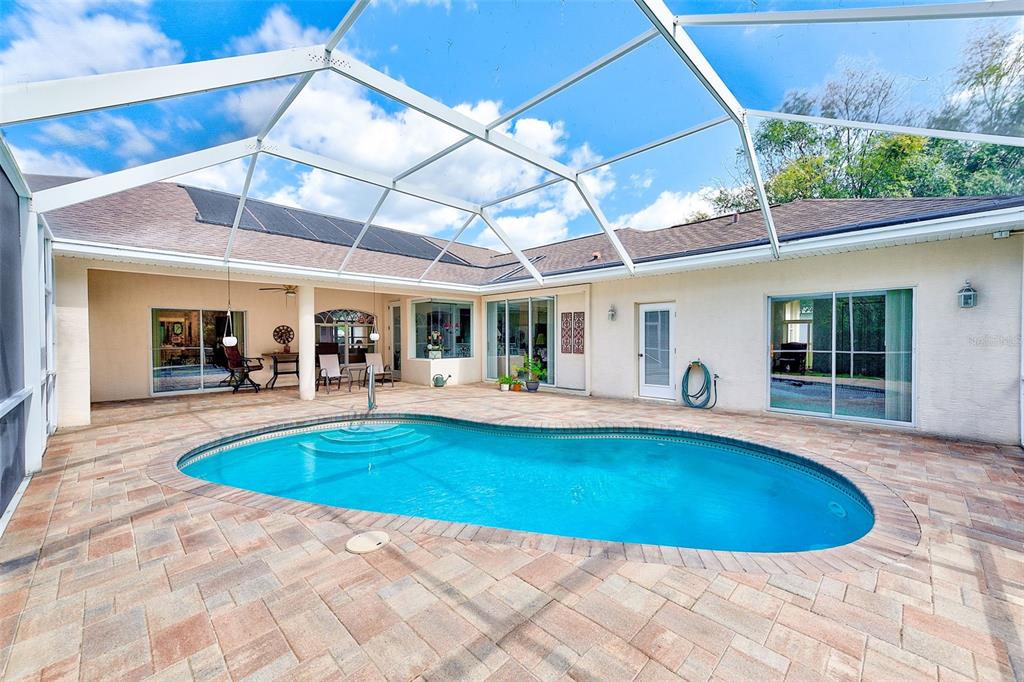 4 Poppy Court Homosassa, FL 34446 - Photo 41 of 55 a view of swimming pool with outdoor seating