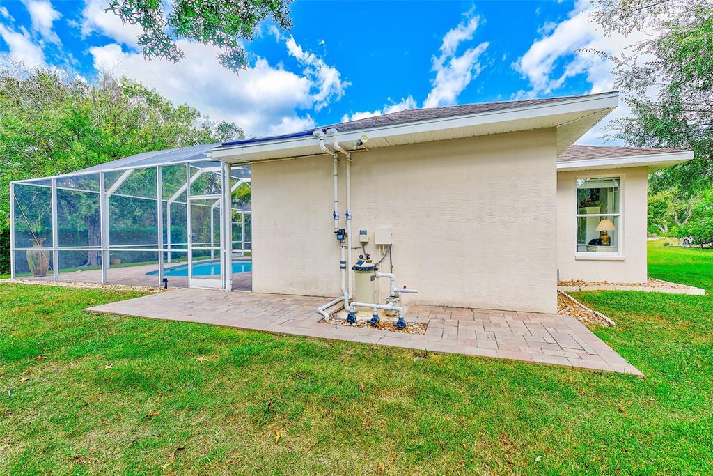 4 Poppy Court Homosassa, FL 34446 - Photo 47 of 55 a view of a backyard with a garden and plants