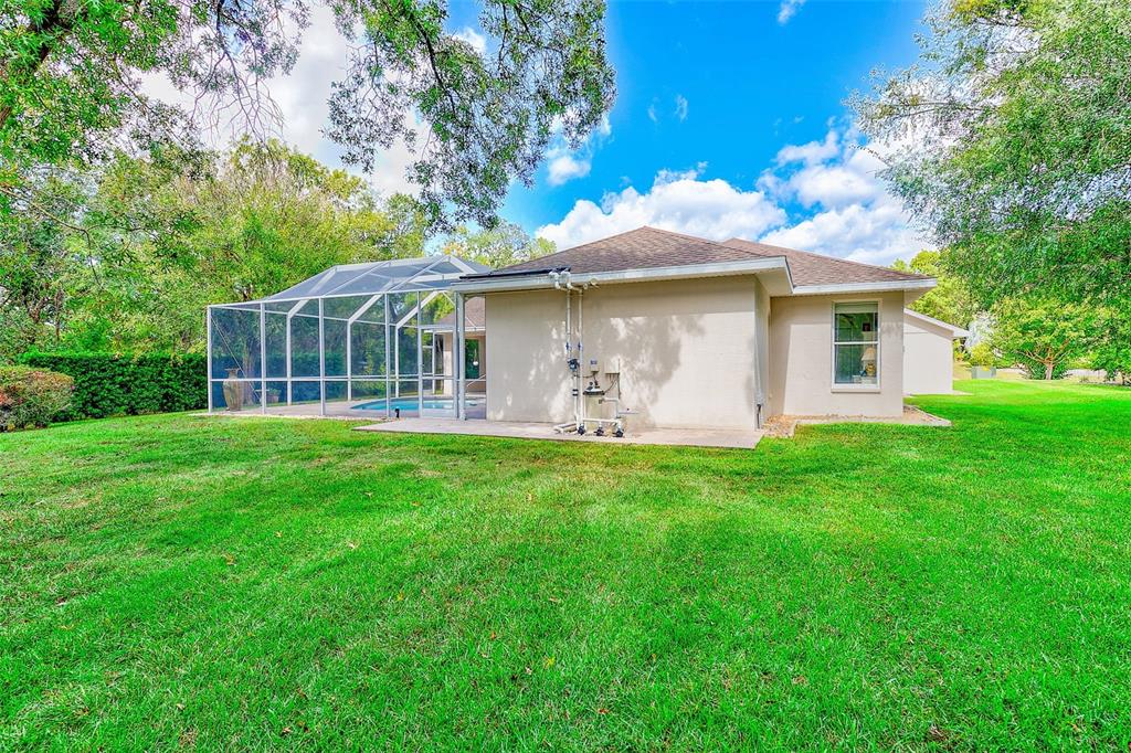 4 Poppy Court Homosassa, FL 34446 - Photo 48 of 55 a front view of a house with garden