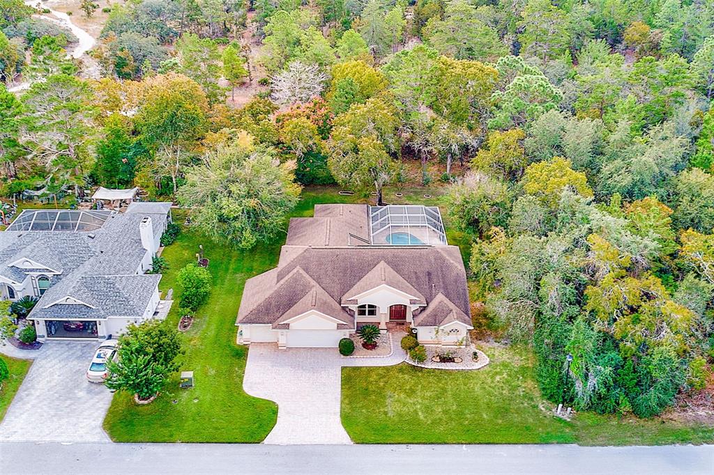 4 Poppy Court Homosassa, FL 34446 - Photo 52 of 55 an aerial view of house with yard