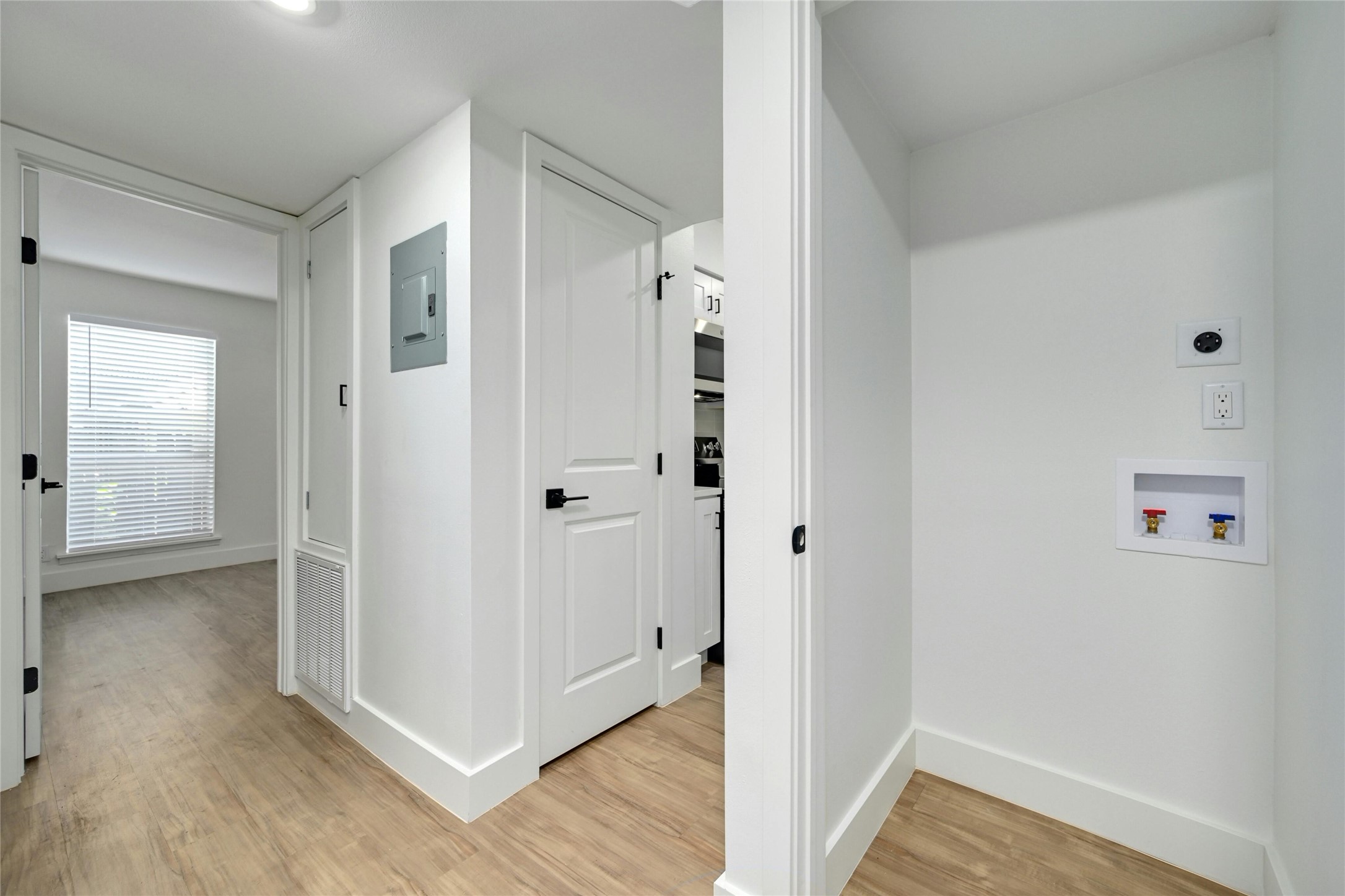 202 East 45th Street, Unit 103 Austin, TX 78751 - Photo 11 of 27 a view of a hallway with wooden floor and closet