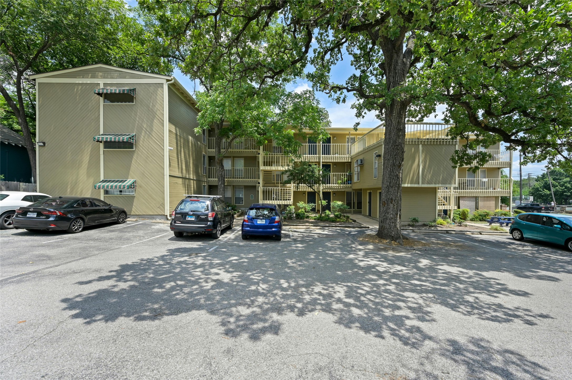 202 East 45th Street, Unit 103 Austin, TX 78751 - Photo 2 of 27 a view of a car parked in front of a house