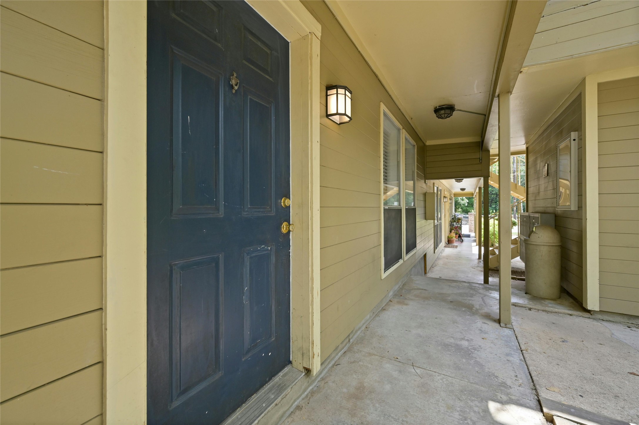 202 East 45th Street, Unit 103 Austin, TX 78751 - Photo 5 of 27 a view of a hallway with wooden shelves