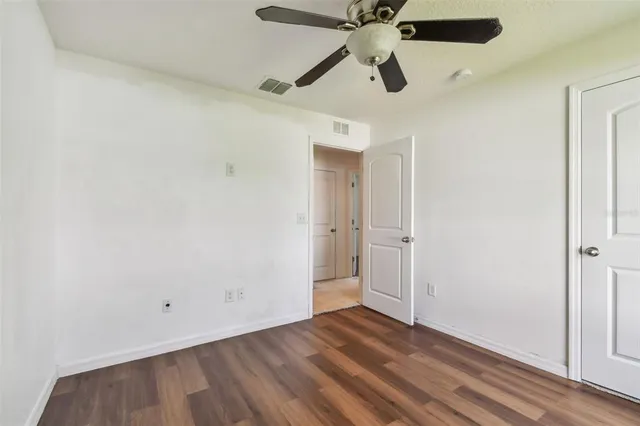 a view of a backyard with sitting area