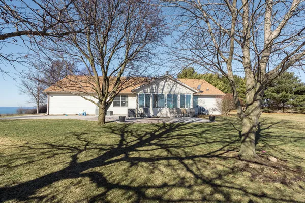 a view of house with outdoor space
