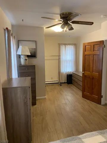 a view of a kitchen with a sink and cabinet area