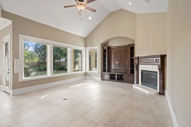 a view of a hallway with seating area