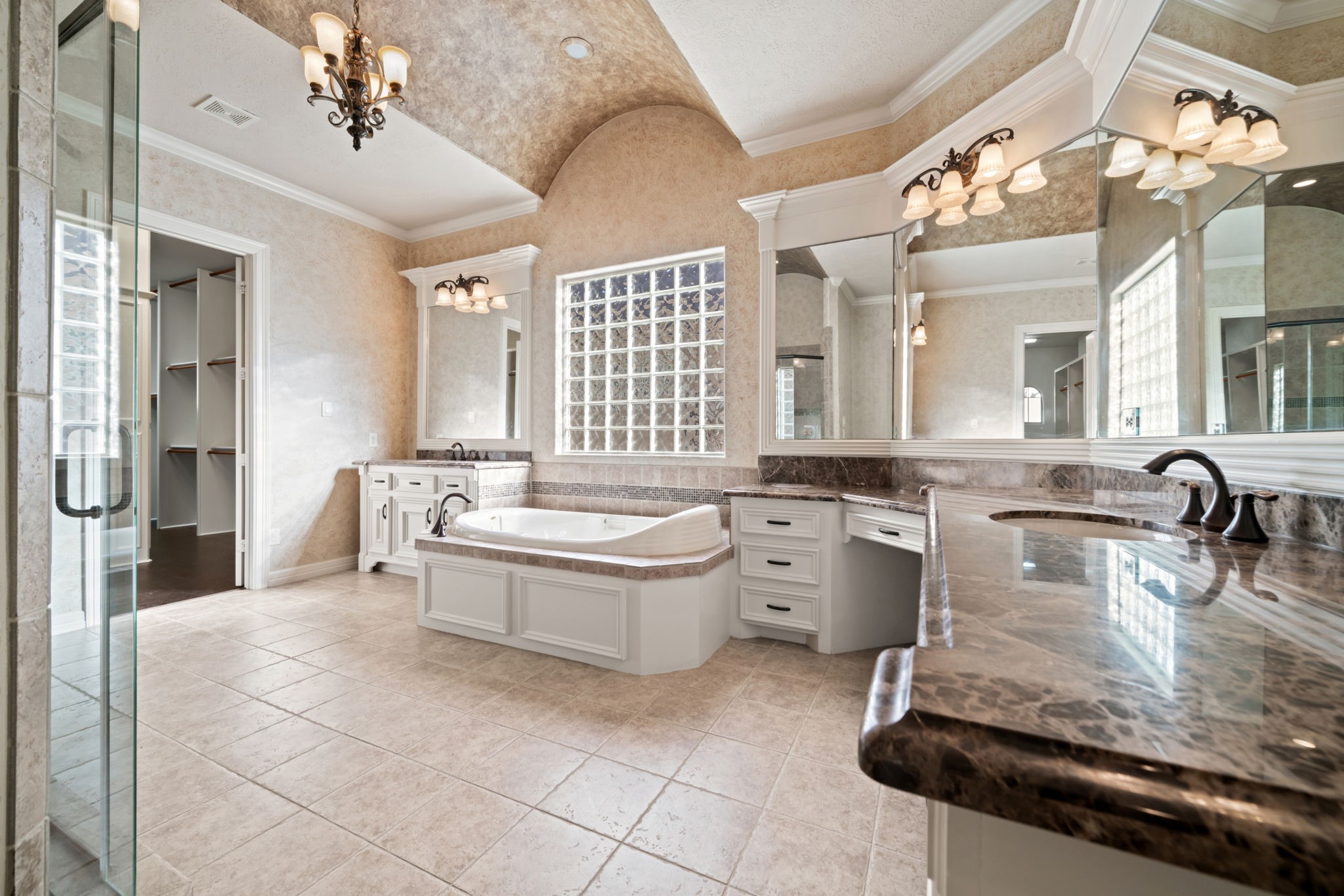 17010 Lapeer Court Spring, TX 77379 - Photo 23 of 36 a large spacious bathroom with a granite countertop sink mirror and bathtub