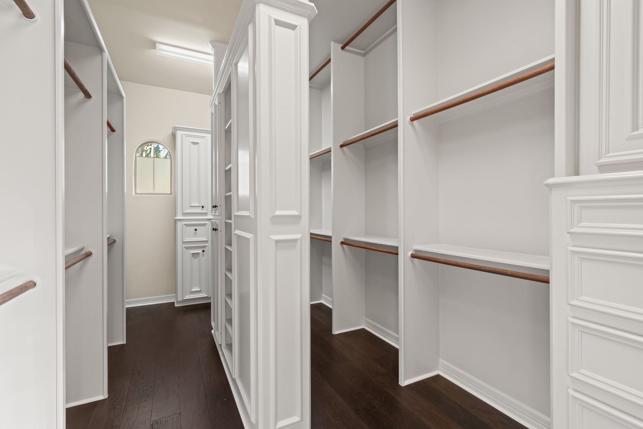 17010 Lapeer Court Spring, TX 77379 - Photo 25 of 36 a view of walk in closet with wooden floor