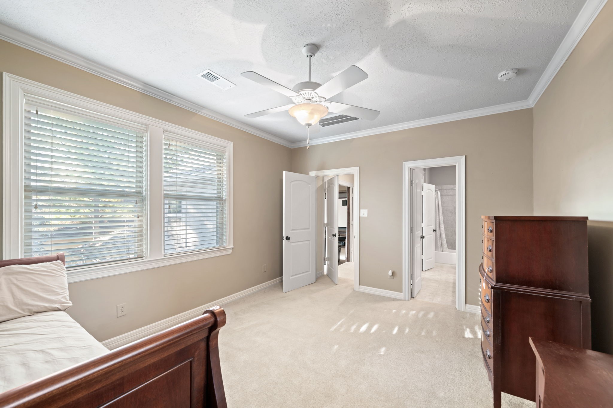 17010 Lapeer Court Spring, TX 77379 - Photo 32 of 36 a bedroom with a bed and a window