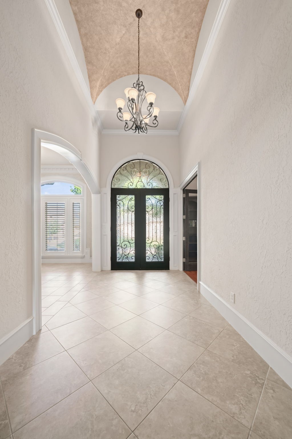17010 Lapeer Court Spring, TX 77379 - Photo 4 of 36 a view of an empty room with a chandelier
