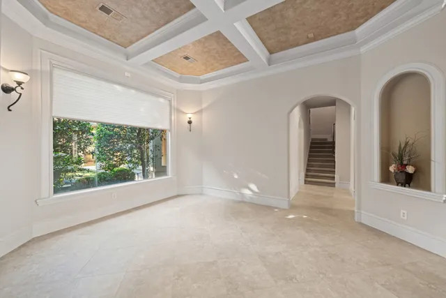 an empty room with windows