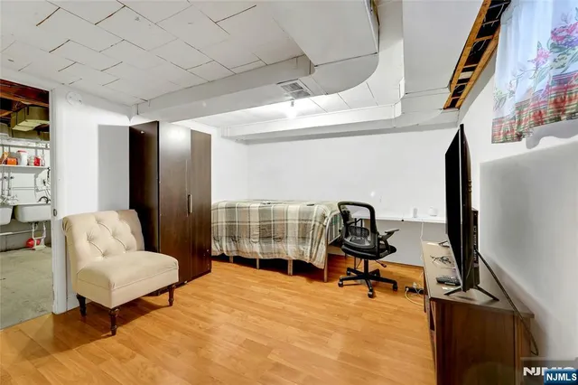 a room with furniture and gym equipment