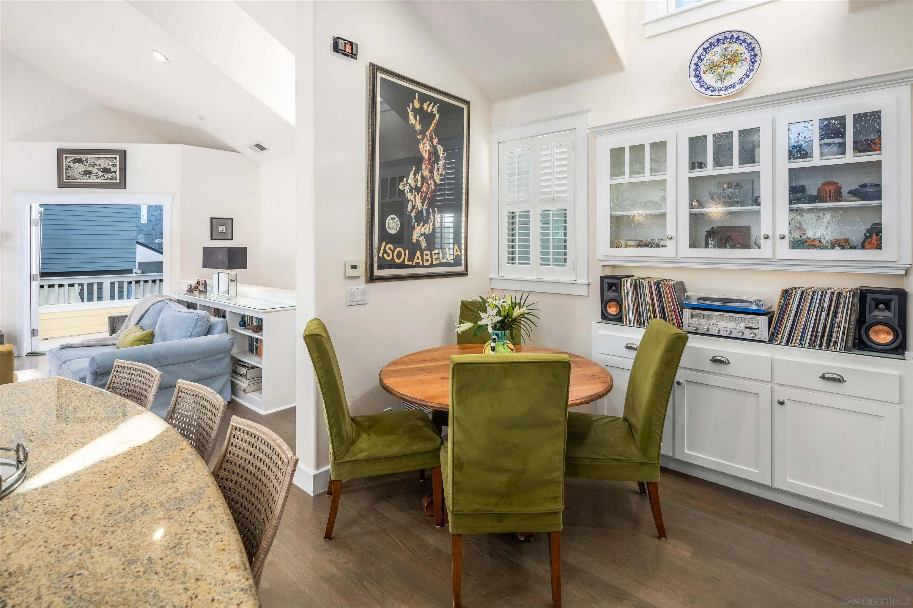 746 G Avenue Coronado, CA 92118 - Photo 13 of 34 a view of a dining room with furniture window and wooden floor