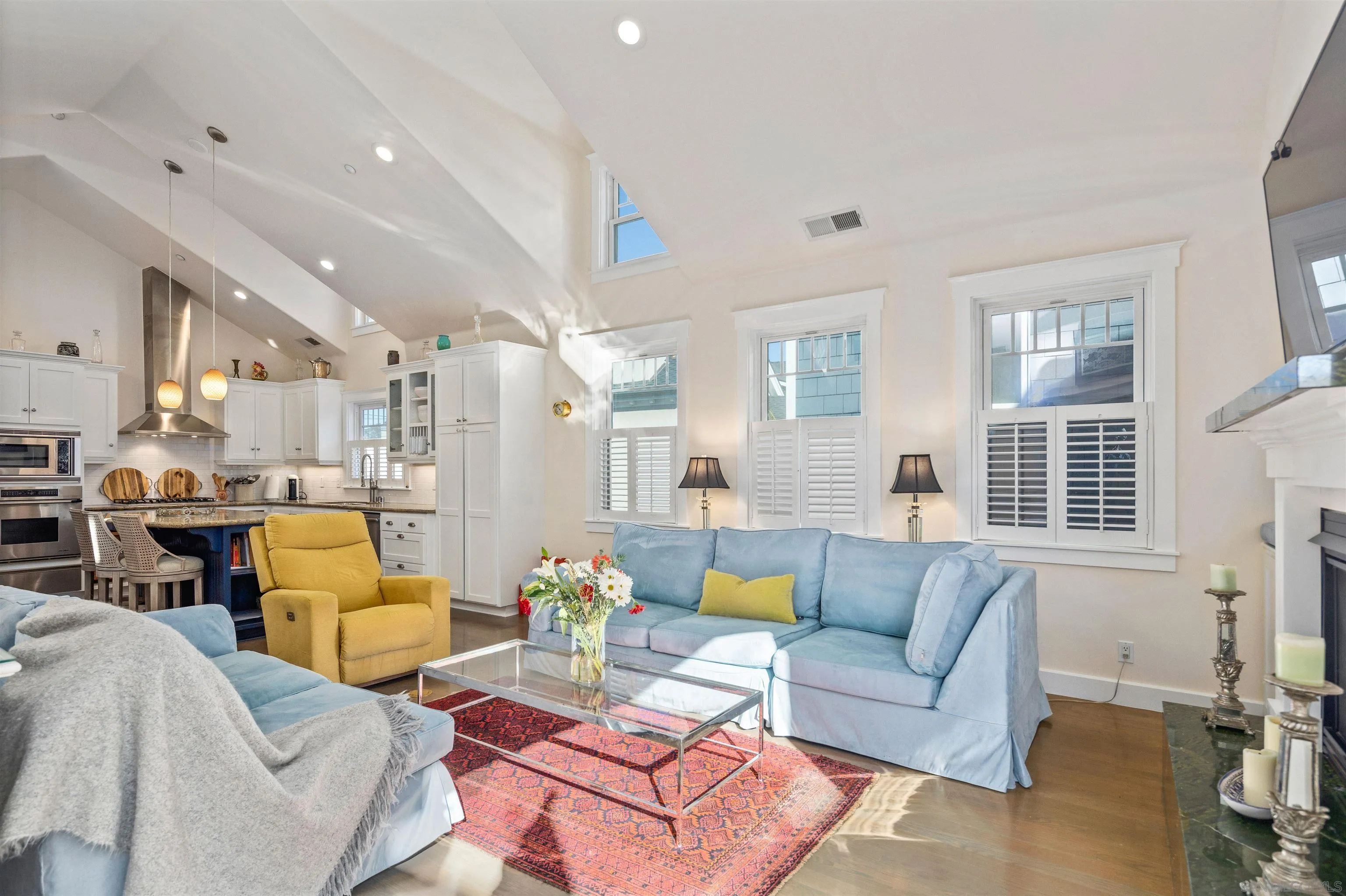 746 G Avenue Coronado, CA 92118 - Photo 20 of 34 a living room with furniture and kitchen view