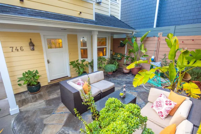 a front view of a house with patio