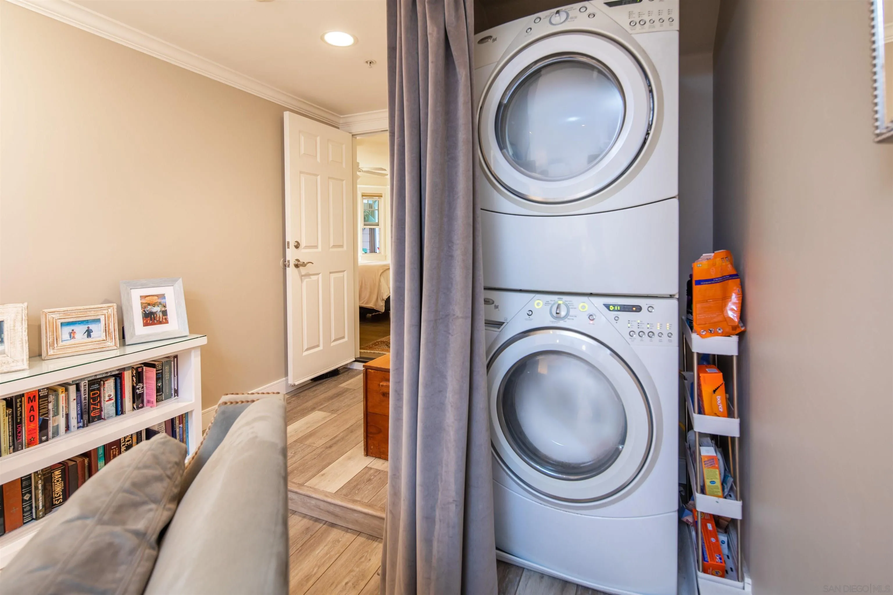 746 G Avenue Coronado, CA 92118 - Photo 10 of 34 a view of a hallway with washer and dryer