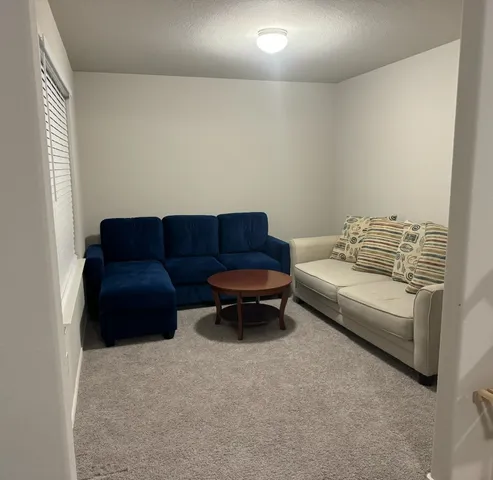 a view of a hallway with workspace