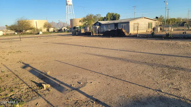 a view of a street with cars