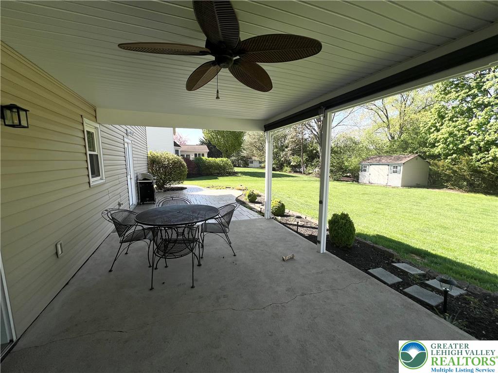 3071 Athena Drive Bethlehem, PA 18017 - Photo 7 of 27 a view of a patio with a table chairs and a backyard
