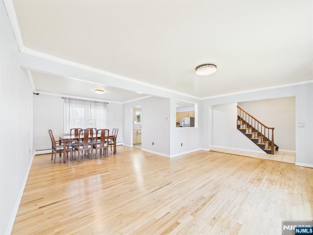 50 Hepburn Road Clifton, NJ 07012 - Photo 11 of 42 a view of dining room with furniture and wooden floor