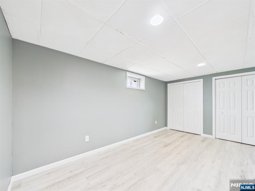 50 Hepburn Road Clifton, NJ 07012 - Photo 22 of 42 an empty room with windows