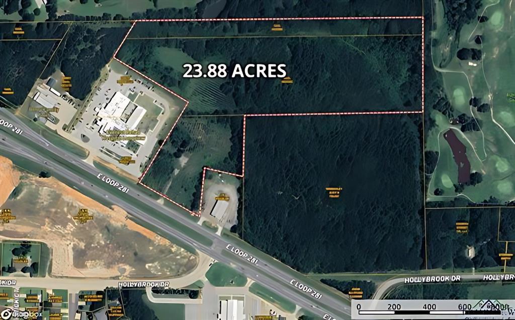 a view of a street with an outdoor space