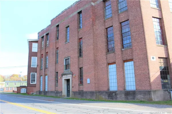 a view of a building along the street