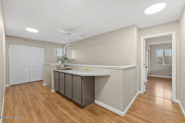 a view of a kitchen from the hallway