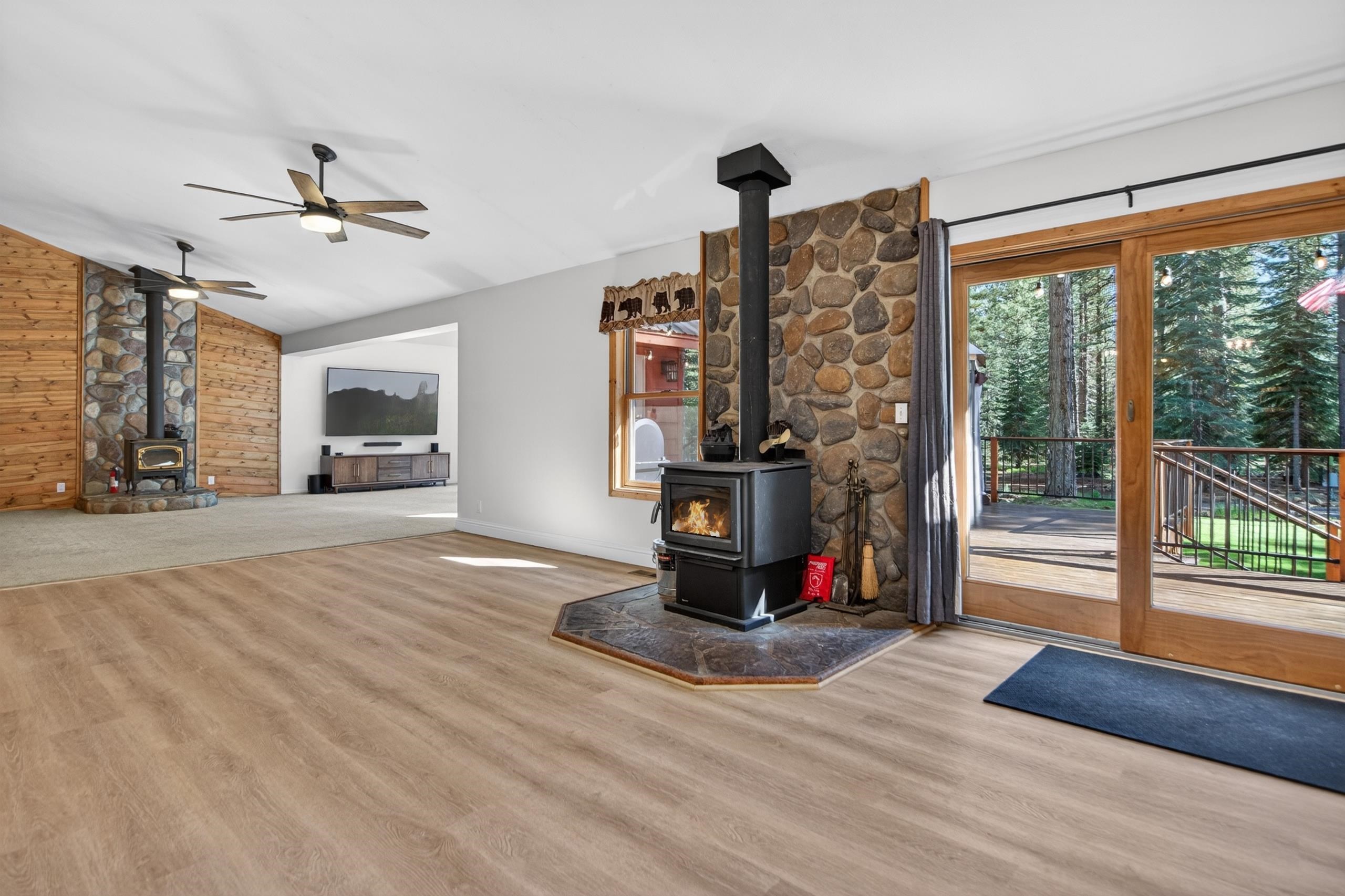 463-000 Moonlight Ranch Rd Westwood Road Susanville, CA 96130 - Photo 10 of 46 a view of a living room with furniture and a floor to ceiling window