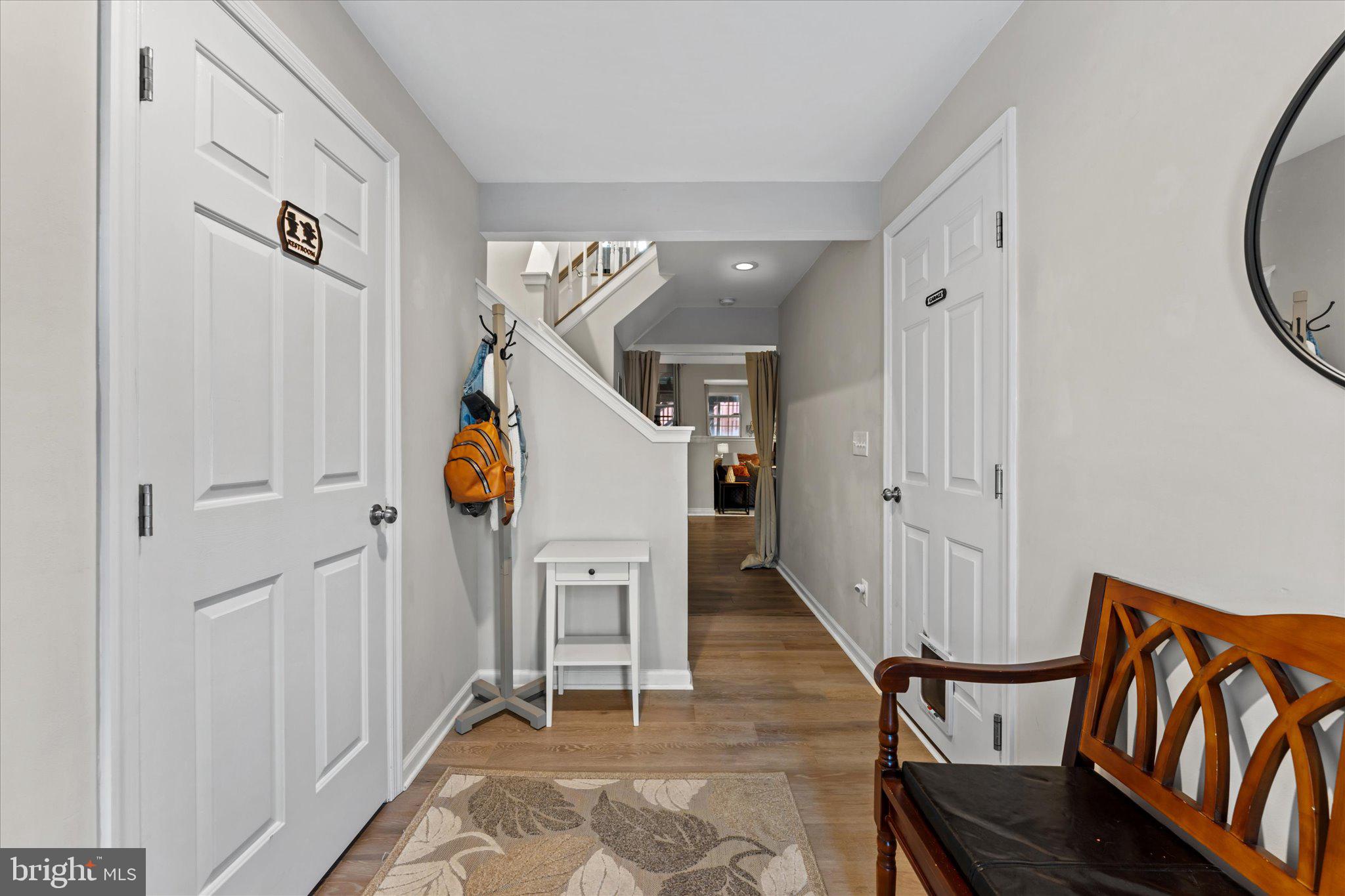 163 Shirley Square Southeast Leesburg, VA 20175 - Photo 2 of 45 a view of entryway with furniture and wooden floor