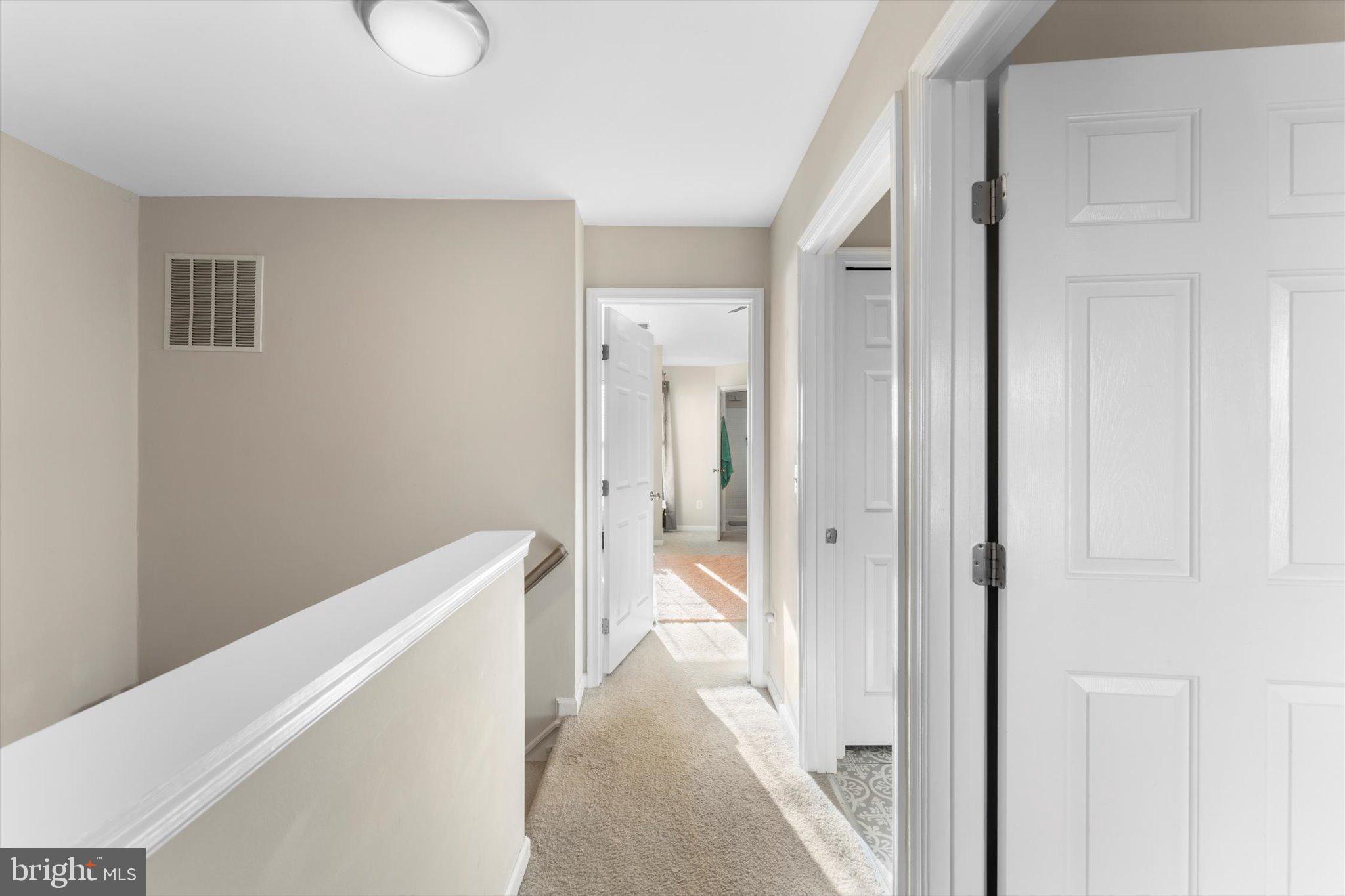 163 Shirley Square Southeast Leesburg, VA 20175 - Photo 23 of 45 a view of hallway with toilet