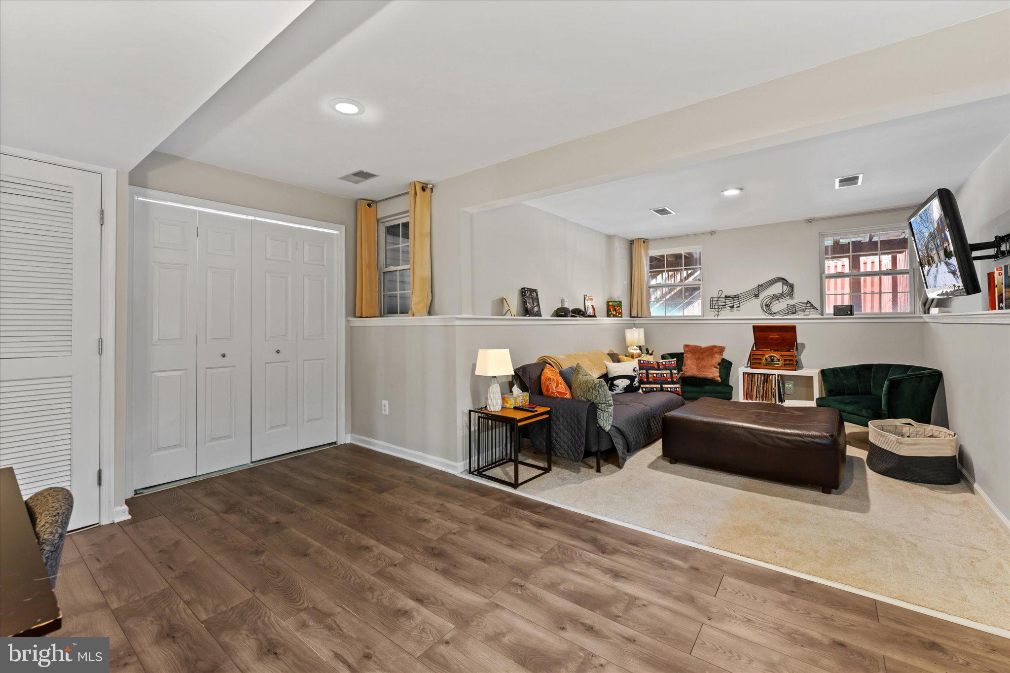 163 Shirley Square Southeast Leesburg, VA 20175 - Photo 7 of 45 a bed room with a bed and a couch