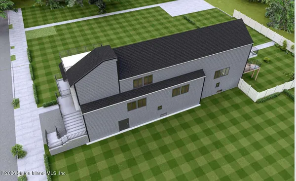 a view of a balcony with yard