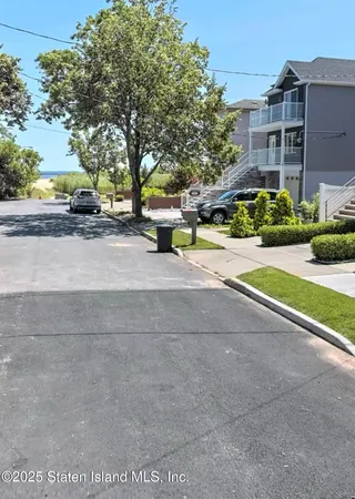 a view of a street with houses