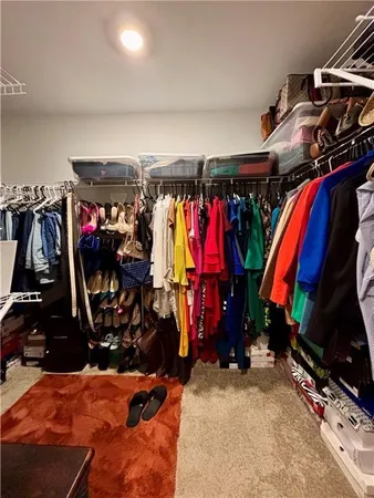 a bedroom with furniture and a couch