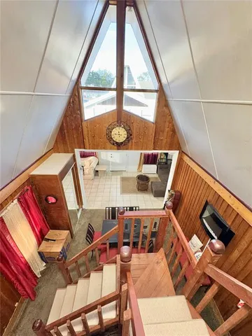 a view of an ocean with trees in the background