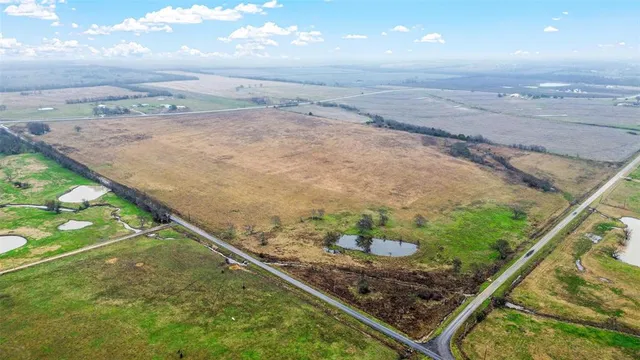 a view of a back yard of a house