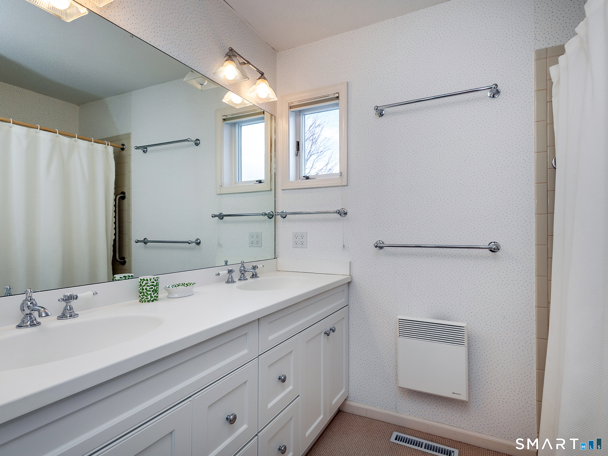19 Juniper Meadow Road, Unit 19 Washington, CT 06794 - Photo 17 of 31 a bathroom with a sink and a mirror