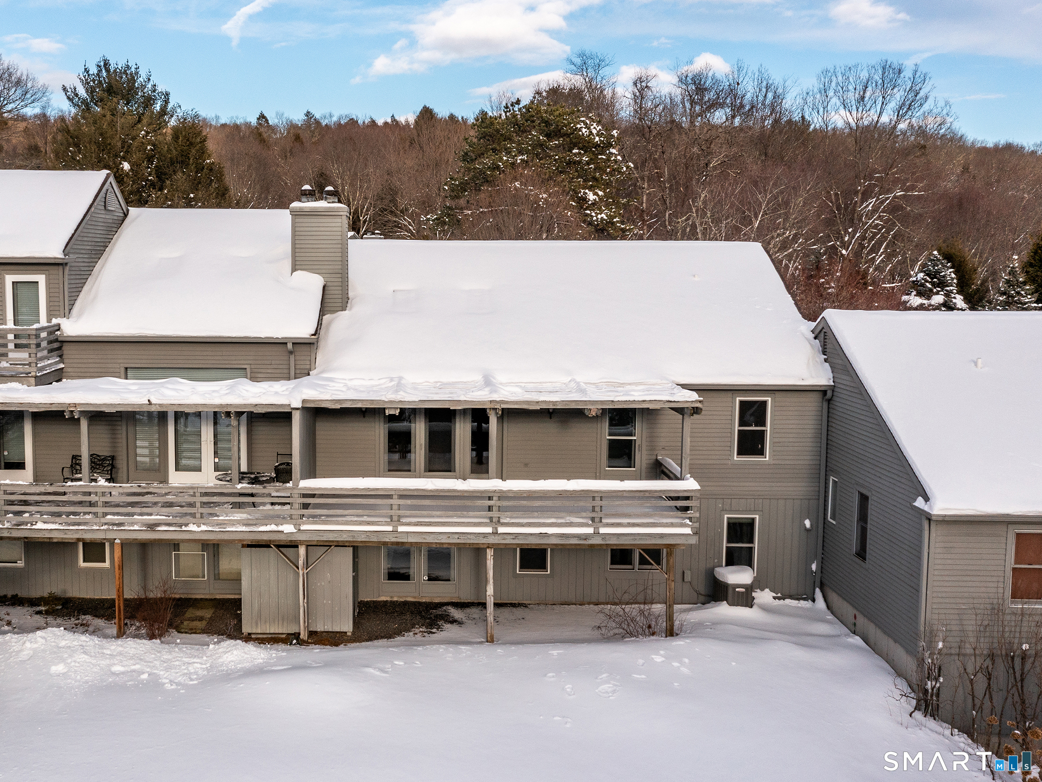 19 Juniper Meadow Road, Unit 19 Washington, CT 06794 - Photo 2 of 31 a view of a white building among the street and a building
